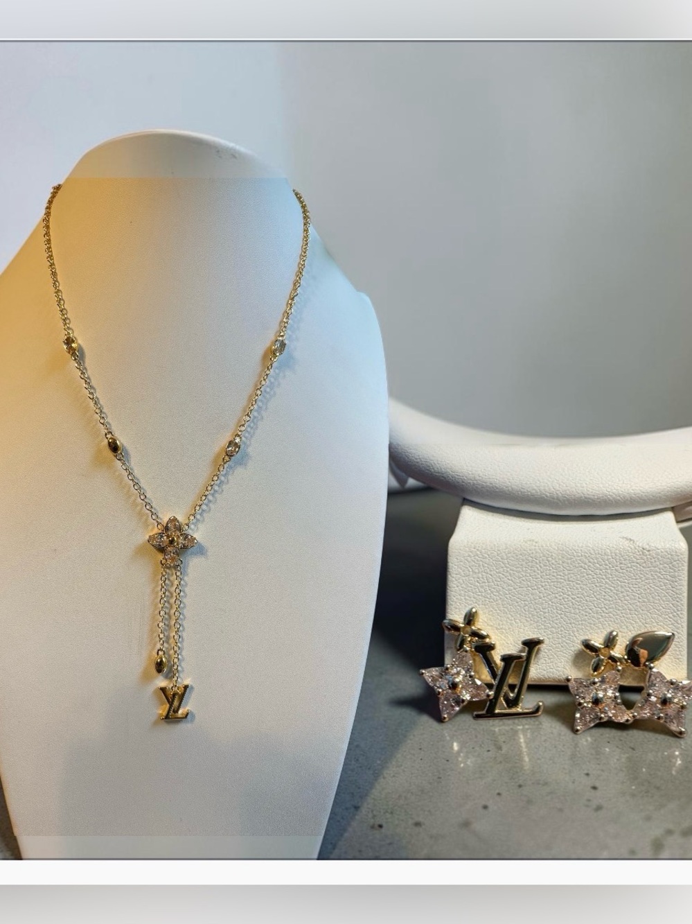 Gold-Tone Monogram Flower Lariat Necklace and Earring set.
